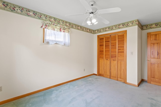 1A Rowland St, Somersworth, NH 03878 - unfurnished bedroom with light colored carpet, a closet, and a ceiling fan