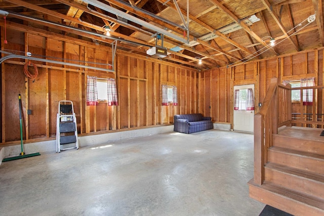 1A Rowland St, Somersworth, NH 03878 - garage featuring a garage door opener