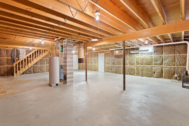 1A Rowland St, Somersworth, NH 03878 - basement with stairs and a central vacuum unit