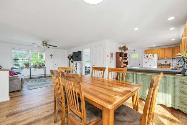 145 Bow Lake Rd, Barnstead, NH 03218 - dining room featuring light wood-style floors, a ceiling fan, baseboard heating, and recessed lighting
