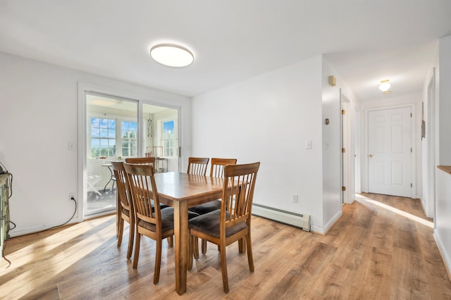 145 Bow Lake Rd, Barnstead, NH 03218 - dining room featuring a baseboard radiator and light wood-style floors