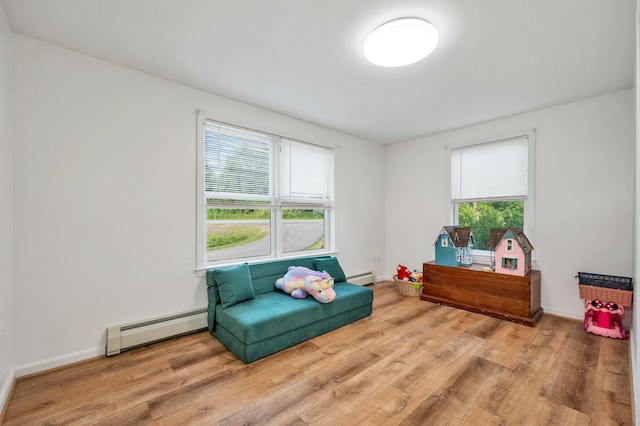 145 Bow Lake Rd, Barnstead, NH 03218 - sitting room with baseboard heating and wood finished floors