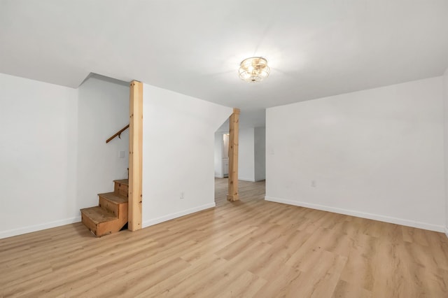 145 Bow Lake Rd, Barnstead, NH 03218 - unfurnished living room featuring light wood-style floors and stairway