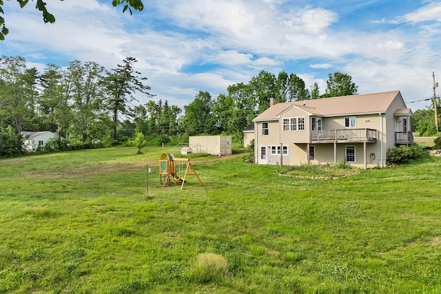 145 Bow Lake Rd, Barnstead, NH 03218 - view of green lawn with a deck