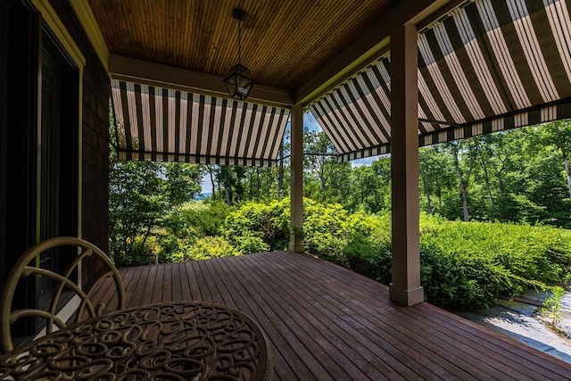 109 Reserve Pl, Concord, NH 03301 - wooden deck featuring view of scattered trees