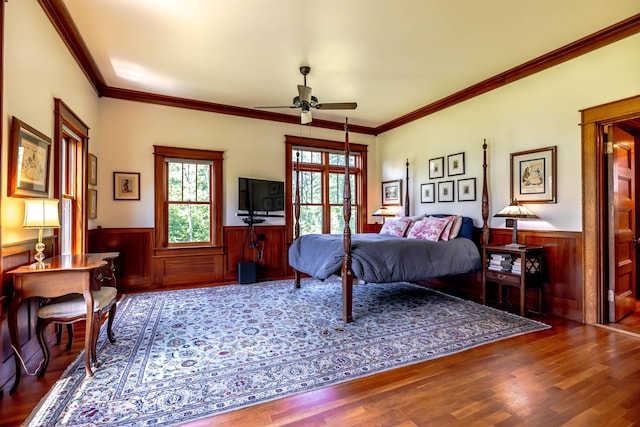 109 Reserve Pl, Concord, NH 03301 - bedroom with wainscoting, wood finished floors, crown molding, and wood walls
