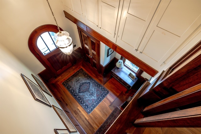 109 Reserve Pl, Concord, NH 03301 - staircase featuring healthy amount of natural light and wood finished floors