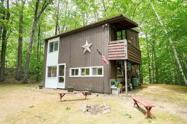 59 Langdorf St, Moultonborough, NH 03254 - view of outbuilding with a forest view