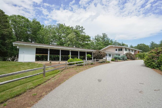 59 Langdorf St, Moultonborough, NH 03254 - view of front of house with an outdoor structure and an exterior structure