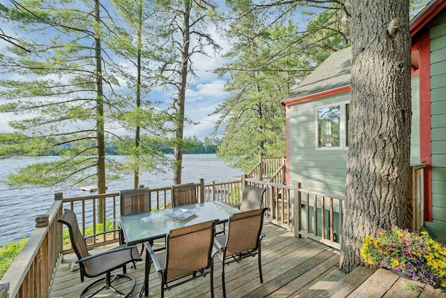 6 Cove Rd, Wakefield, NH 03830 - wooden deck with a water view and outdoor dining area
