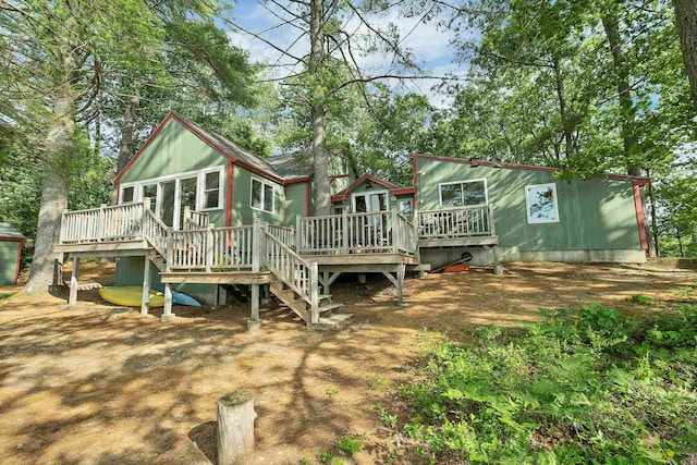6 Cove Rd, Wakefield, NH 03830 - back of property featuring a wooden deck and stairway