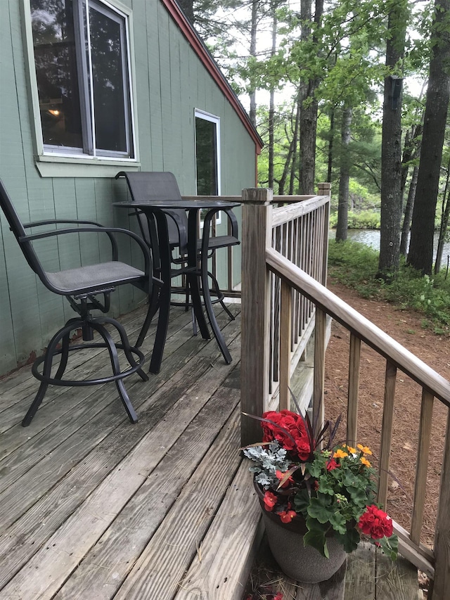 6 Cove Rd, Wakefield, NH 03830 - wooden terrace with outdoor dining space