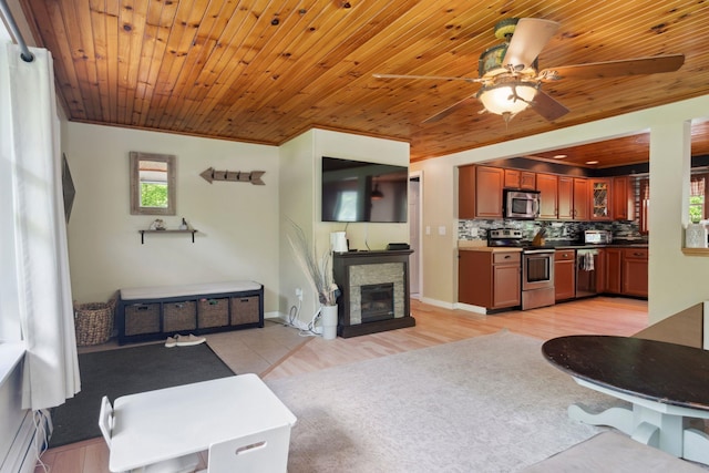 115 Blackwater Rd, Somersworth, NH 03878 - living room with wood ceiling, a ceiling fan, and a fireplace