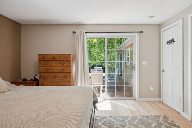 115 Blackwater Rd, Somersworth, NH 03878 - bedroom with access to exterior and wood finished floors