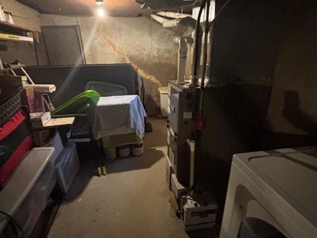 131 Gilmanton Rd, Belmont, NH 03220 - unfinished below grade area with washer / clothes dryer