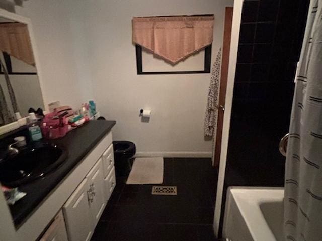 131 Gilmanton Rd, Belmont, NH 03220 - bathroom featuring vanity and shower / bath combo with shower curtain