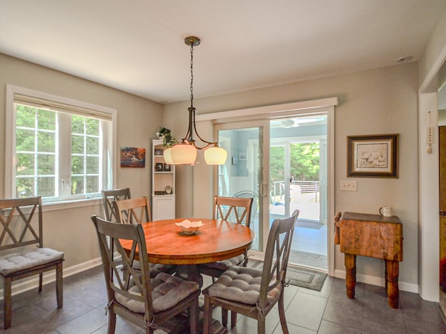 138 Page Rd, New London, NH 03257 - dining area with tile patterned flooring and baseboards
