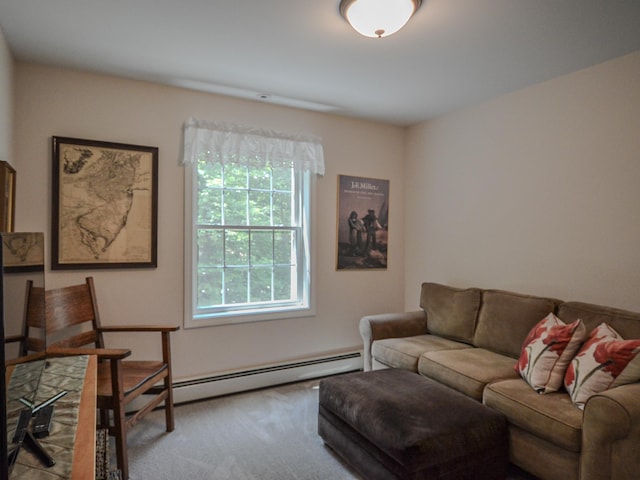 138 Page Rd, New London, NH 03257 - carpeted living room featuring a baseboard heating unit