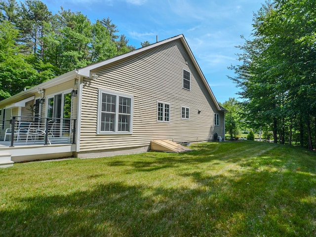138 Page Rd, New London, NH 03257 - view of home's exterior featuring a lawn