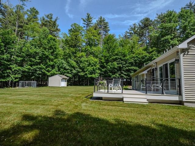 138 Page Rd, New London, NH 03257 - view of grassy yard with a shed and a deck