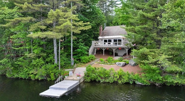 98 Marys Rd, Sunapee, NH 03782 - back of house featuring stairs, a deck with water view, and a chimney