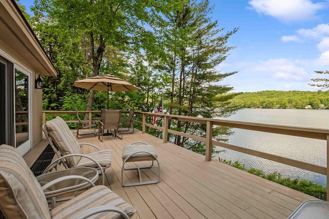 98 Marys Rd, Sunapee, NH 03782 - deck featuring outdoor dining area and a water view