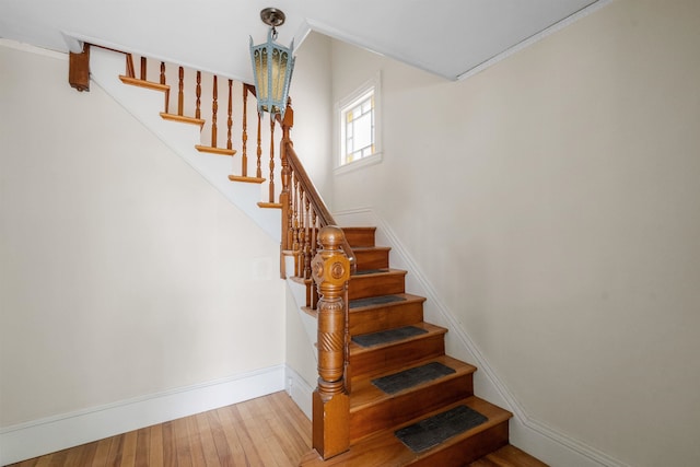 3 Essex St, Concord, NH 03301 - stairs featuring wood finished floors and ornamental molding