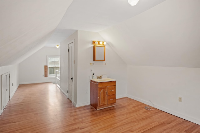 3 Essex St, Concord, NH 03301 - additional living space with vaulted ceiling and light wood-style flooring