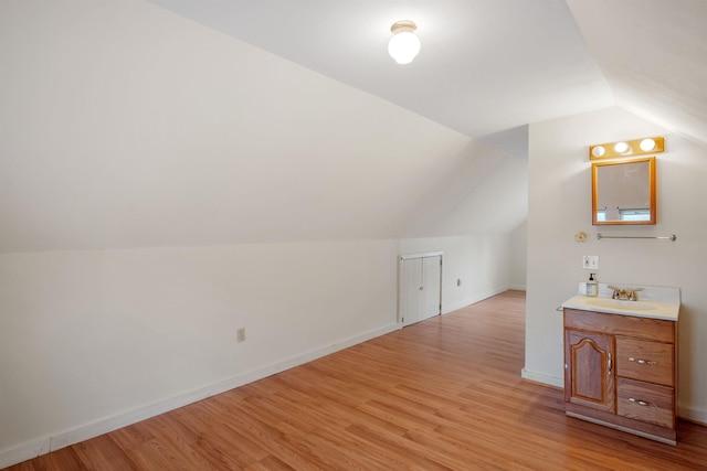3 Essex St, Concord, NH 03301 - additional living space with lofted ceiling and light wood-style flooring