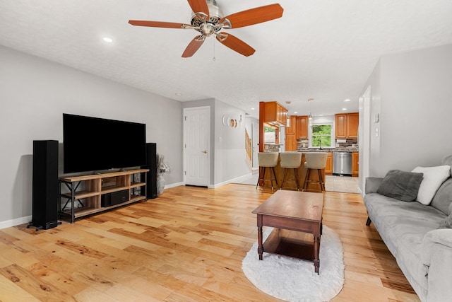 56 Durham Rd Unit 62, Dover, NH 03820 - living room featuring light wood-style floors, a ceiling fan, and recessed lighting