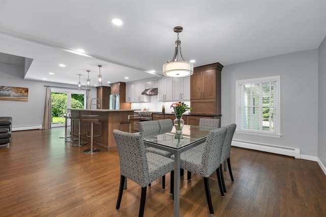 292 Forest Rd, Wolfeboro, NH 03894 - dining space with a baseboard heating unit, dark wood-style floors, and recessed lighting