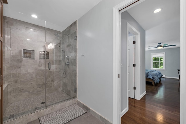 292 Forest Rd, Wolfeboro, NH 03894 - bathroom with a shower stall, connected bathroom, ceiling fan, wood finished floors, and recessed lighting