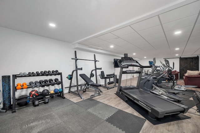 292 Forest Rd, Wolfeboro, NH 03894 - exercise room with wood finished floors and recessed lighting