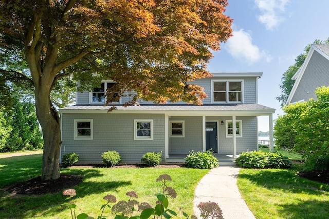 27 Wentworth Ter, Dover, NH 03820 - view of front of home featuring a front yard and a porch