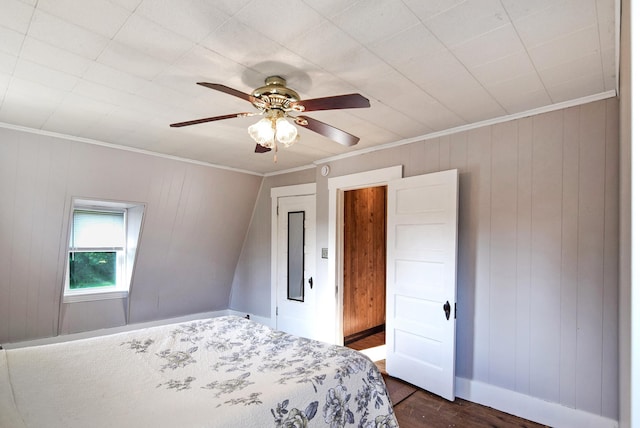49 Bowker St, Claremont, NH 03743 - bedroom featuring dark wood finished floors, ornamental molding, a ceiling fan, and wood walls