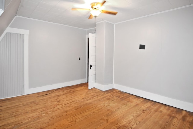 49 Bowker St, Claremont, NH 03743 - spare room with ornamental molding, light wood-style floors, and ceiling fan