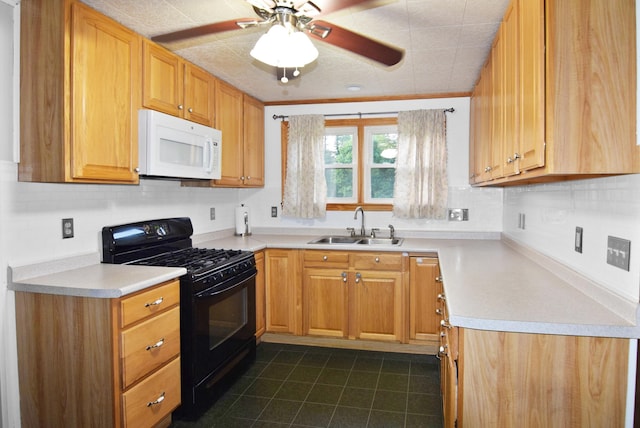 49 Bowker St, Claremont, NH 03743 - kitchen with white microwave, black range with gas cooktop, decorative backsplash, a ceiling fan, and light countertops