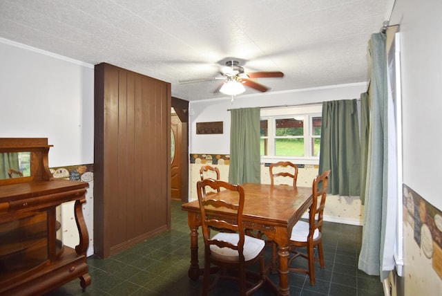49 Bowker St, Claremont, NH 03743 - dining space featuring ceiling fan, crown molding, and dark flooring
