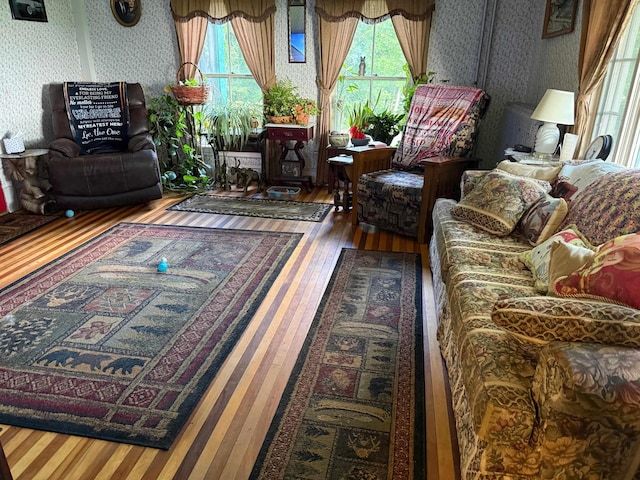 50 Lane Ridge Rd, Claremont, NH 03743 - living room with wallpapered walls and wood finished floors