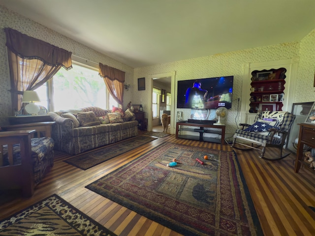 50 Lane Ridge Rd, Claremont, NH 03743 - living room featuring wallpapered walls and wood finished floors