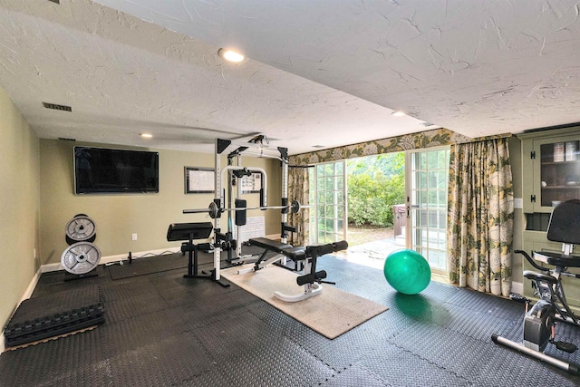 16 Storybrook Ln, Amherst, NH 03031 - workout room featuring a textured ceiling and recessed lighting