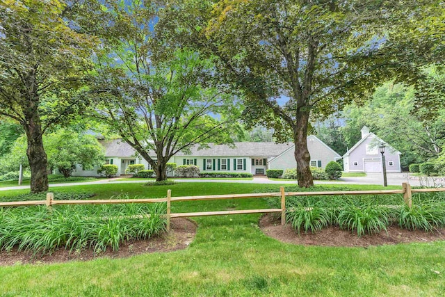 16 Storybrook Ln, Amherst, NH 03031 - view of yard with a garage
