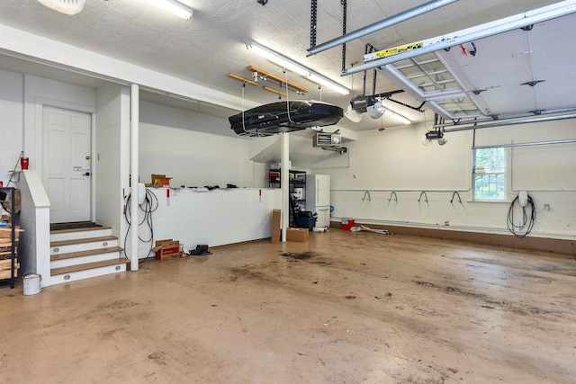 16 Storybrook Ln, Amherst, NH 03031 - garage featuring a garage door opener