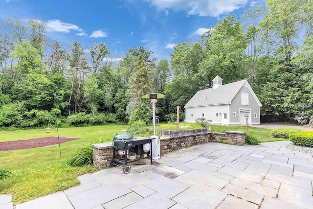 16 Storybrook Ln, Amherst, NH 03031 - view of patio / terrace featuring area for grilling and an outbuilding