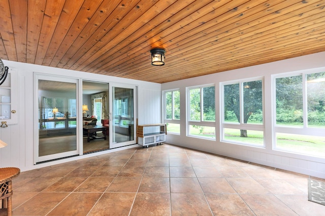 16 Storybrook Ln, Amherst, NH 03031 - unfurnished sunroom with plenty of natural light, tile patterned floors, and wooden ceiling