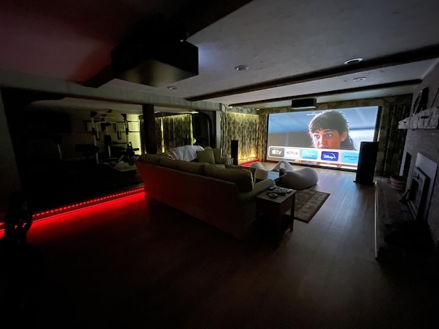16 Storybrook Ln, Amherst, NH 03031 - cinema room with wood finished floors, a fireplace, and beam ceiling