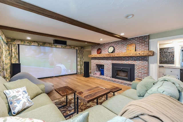 16 Storybrook Ln, Amherst, NH 03031 - living area featuring wood finished floors, beam ceiling, a fireplace, and recessed lighting