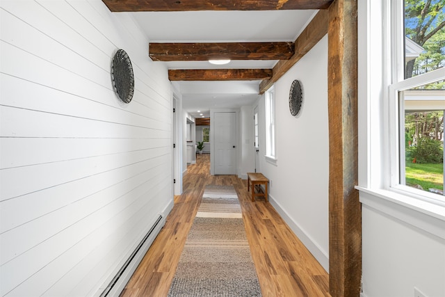 71 Plummer Hill Rd, Belmont, NH 03220 - corridor featuring light wood finished floors, plenty of natural light, beam ceiling, and wooden walls