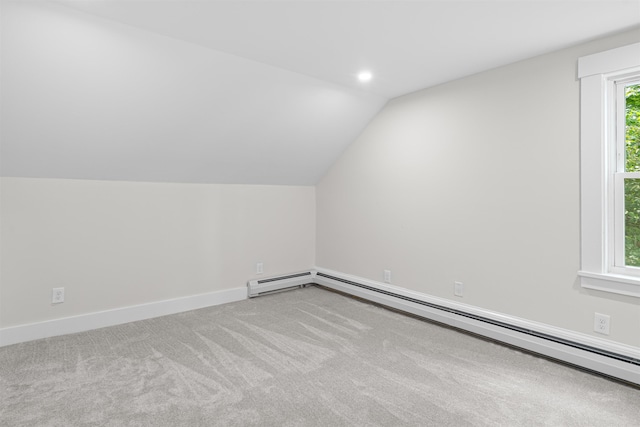 71 Plummer Hill Rd, Belmont, NH 03220 - additional living space with a baseboard heating unit, lofted ceiling, and carpet