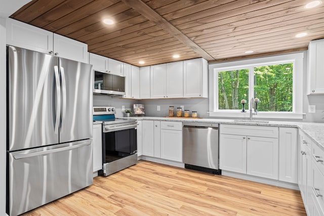 71 Plummer Hill Rd, Belmont, NH 03220 - kitchen featuring appliances with stainless steel finishes, wood ceiling, white cabinets, light wood-style floors, and light stone counters